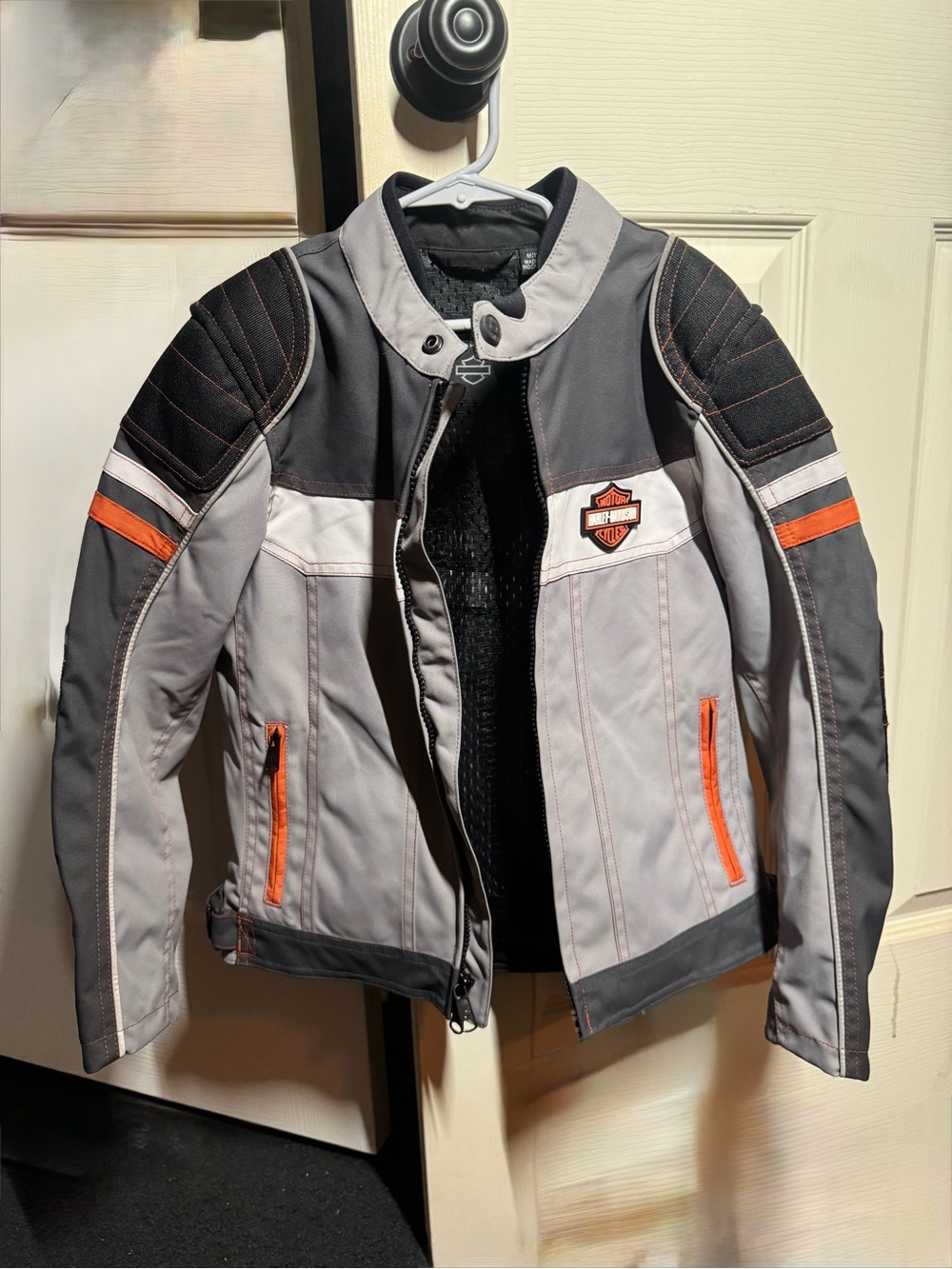 Without tags but never worn! 
Harley-Davidson Kids Gray and Orange Riding Jacket